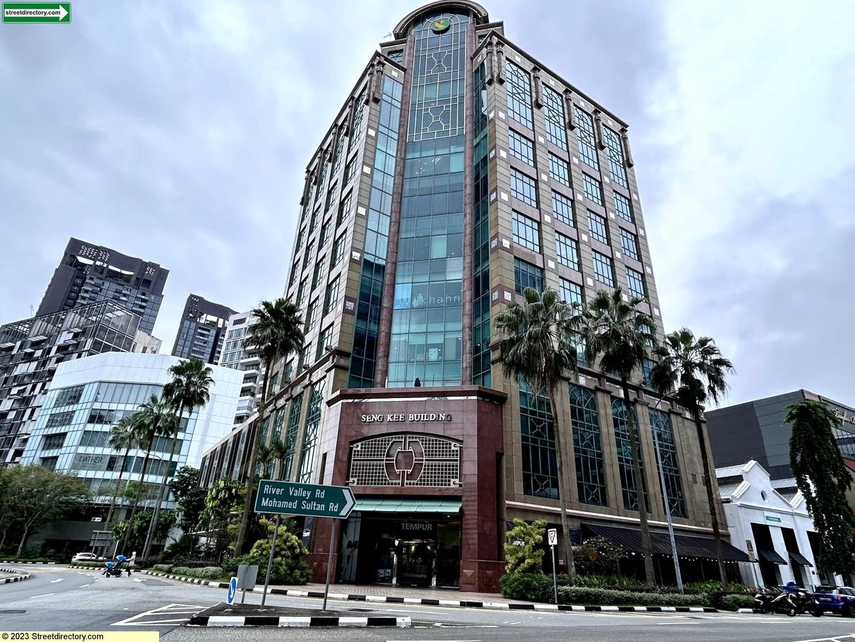 Security officer patrolling commercial building entrance